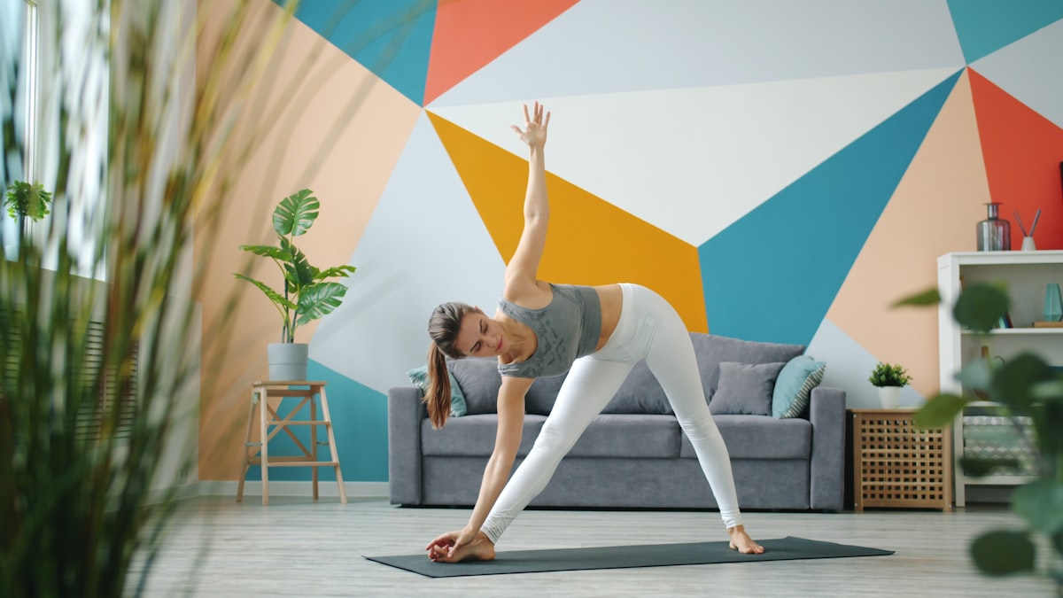 Person performing home workout exercise